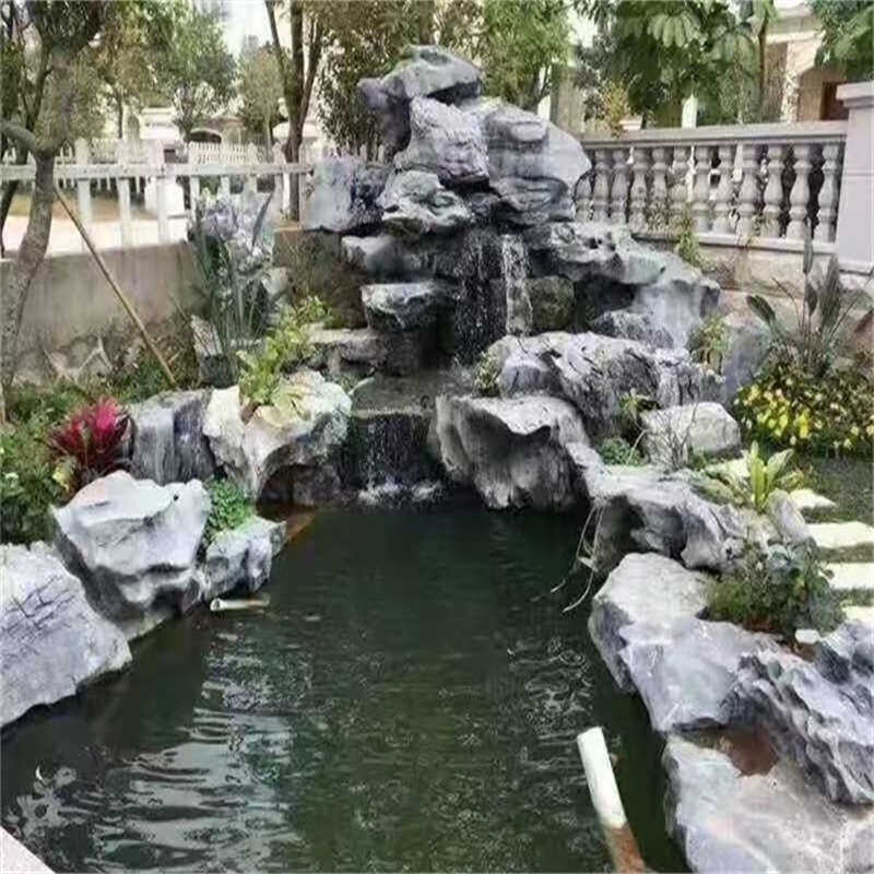 黑龙江庭院假山鱼池图片
